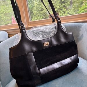 Black Leather Shoulder Bag with Metallic Accents